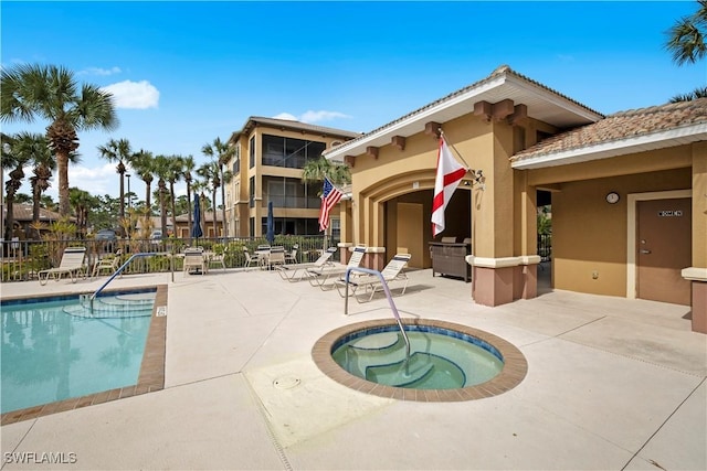 3724 Agualinda Blvd Unit 201, Cape Coral, FL 33914 - community pool featuring a hot tub and a patio area