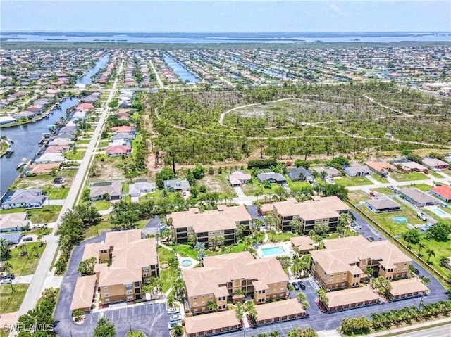 3724 Agualinda Blvd Unit 201, Cape Coral, FL 33914 - aerial view of property's location featuring nearby suburban area and a large body of water