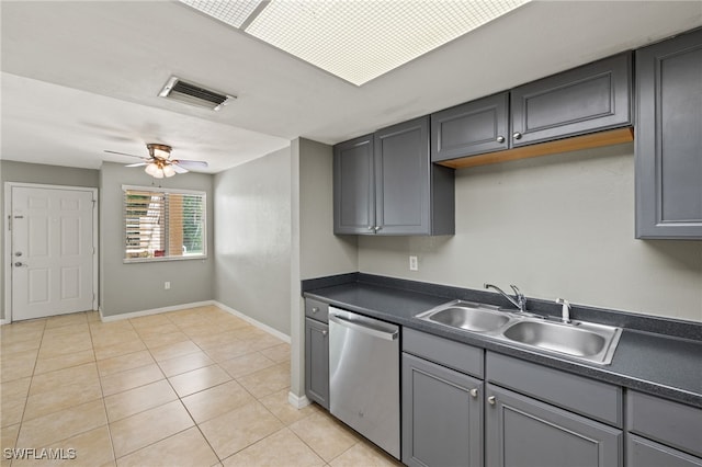 3140 Seasons Way Unit 510, Estero, FL 33928 - kitchen with dishwasher, dark countertops, gray cabinetry, and light tile patterned flooring
