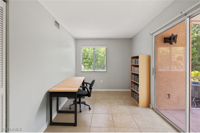 3140 Seasons Way Unit 510, Estero, FL 33928 - home office featuring light tile patterned flooring and baseboards