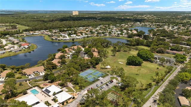 3140 Seasons Way Unit 510, Estero, FL 33928 - aerial view of property and surrounding area featuring a large body of water, nearby suburban area, and a golf course