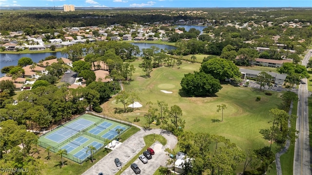 3140 Seasons Way Unit 510, Estero, FL 33928 - aerial overview of property's location featuring a local golf course, a nearby body of water, and nearby suburban area
