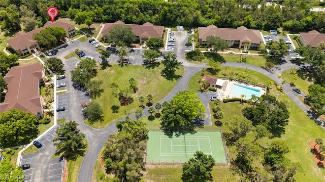 3140 Seasons Way Unit 510, Estero, FL 33928 - aerial perspective of suburban area with a pool area