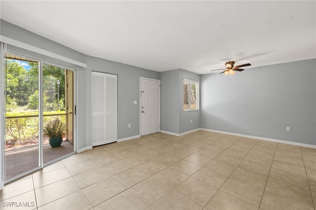 3140 Seasons Way Unit 510, Estero, FL 33928 - unfurnished room with healthy amount of natural light, light tile patterned floors, and a ceiling fan