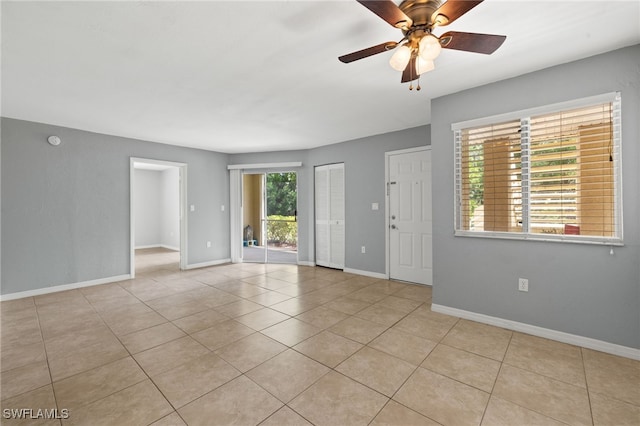 3140 Seasons Way Unit 510, Estero, FL 33928 - empty room featuring ceiling fan and light tile patterned flooring