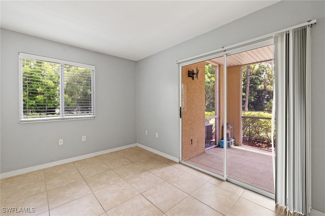 3140 Seasons Way Unit 510, Estero, FL 33928 - tiled empty room with baseboards