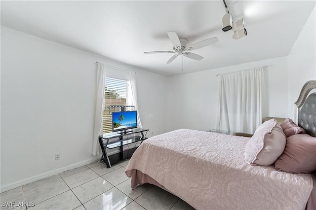 2200 50th St SW, Naples, FL 34116 - bedroom with a ceiling fan and baseboards