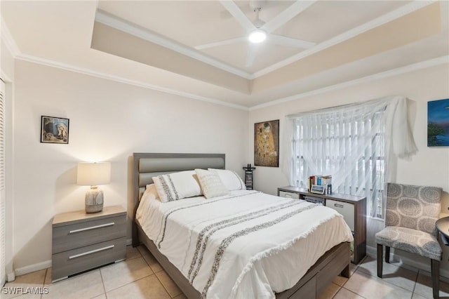3313 Europa Dr Unit 214, Naples, FL 34105 - bedroom with a tray ceiling, crown molding, light tile patterned flooring, and ceiling fan