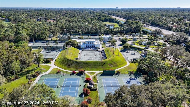 3313 Europa Dr Unit 214, Naples, FL 34105 - aerial overview of property's location with a forest