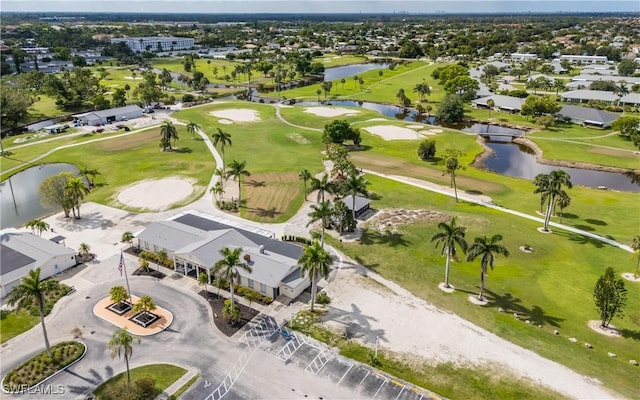 6884 Sandtrap Dr Unit 4, Fort Myers, FL 33919 - aerial perspective of suburban area with a nearby body of water and a local golf course