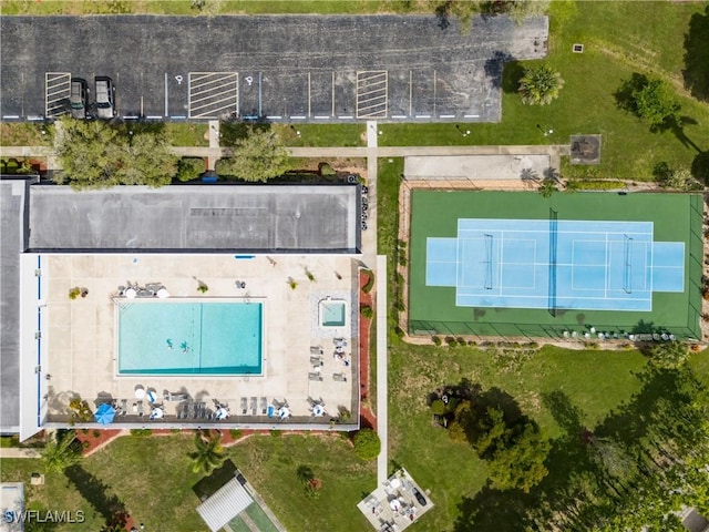 6884 Sandtrap Dr Unit 4, Fort Myers, FL 33919 - drone / aerial view of a pool