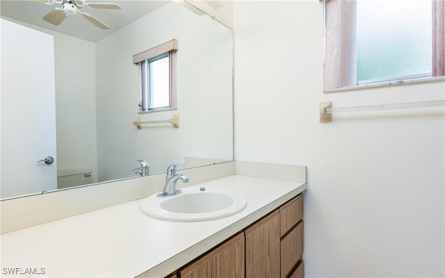6884 Sandtrap Dr Unit 4, Fort Myers, FL 33919 - bathroom with vanity and ceiling fan
