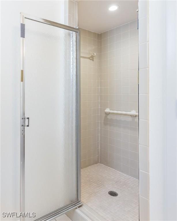 6884 Sandtrap Dr Unit 4, Fort Myers, FL 33919 - bathroom with a shower stall and recessed lighting