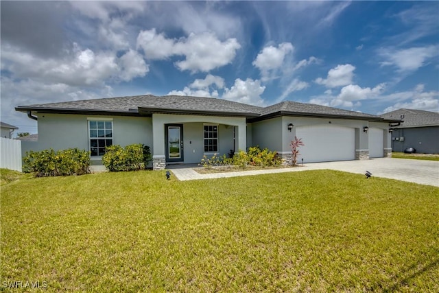 506 NE 2nd Place, Cape Coral, FL 33909 - view of front facade with stucco siding, concrete driveway, a garage, and stone siding