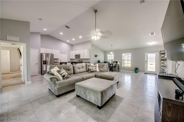 506 NE 2nd Place, Cape Coral, FL 33909 - living area with light tile patterned floors, lofted ceiling, and ceiling fan