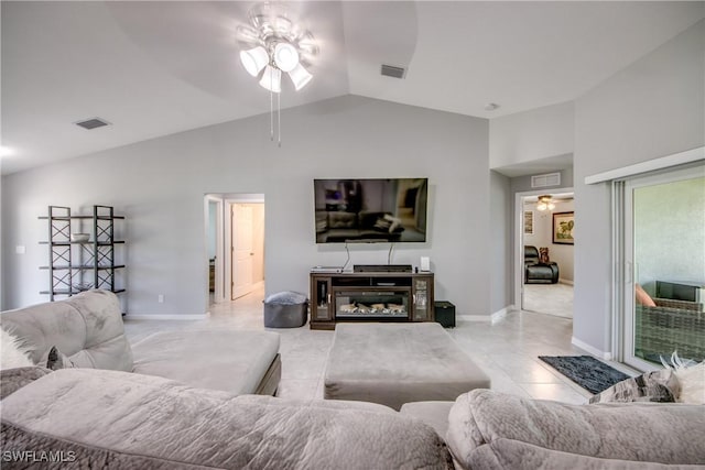 506 NE 2nd Place, Cape Coral, FL 33909 - living area featuring a ceiling fan, lofted ceiling, and light tile patterned flooring