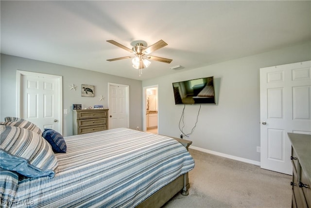 506 NE 2nd Place, Cape Coral, FL 33909 - bedroom with light colored carpet and ceiling fan