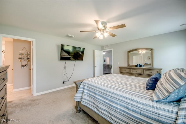 506 NE 2nd Place, Cape Coral, FL 33909 - bedroom featuring light colored carpet and ceiling fan