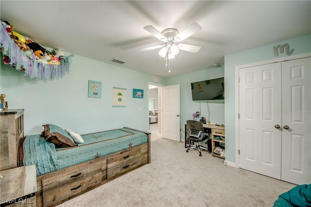 506 NE 2nd Place, Cape Coral, FL 33909 - bedroom featuring a closet, carpet, a ceiling fan, and a desk