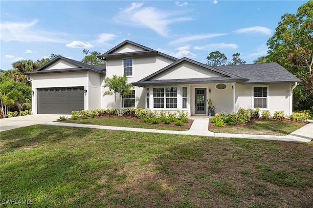 211 11th St NW, Naples, FL 34120 - view of front facade with stucco siding, a front lawn, an attached garage, and concrete driveway