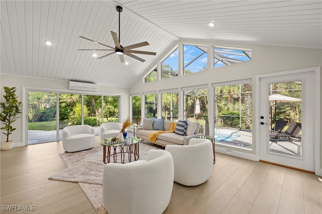211 11th St NW, Naples, FL 34120 - sunroom with a wall unit AC, a wooden deck, hardwood / wood-style floors, high vaulted ceiling, and recessed lighting