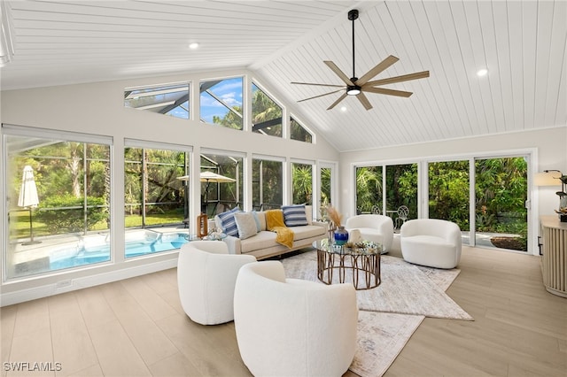 211 11th St NW, Naples, FL 34120 - sunroom with lofted ceiling and plenty of natural light