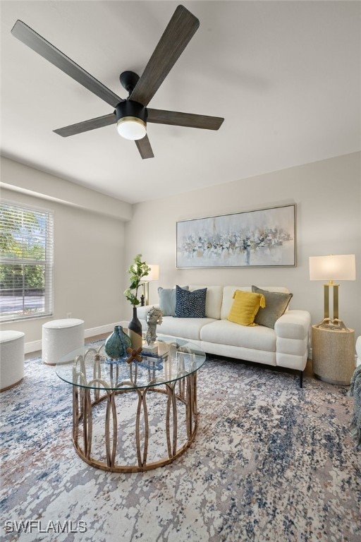211 11th St NW, Naples, FL 34120 - living room with ceiling fan