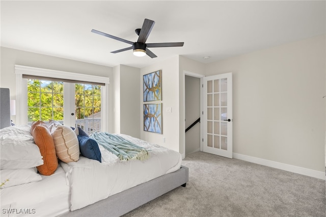 211 11th St NW, Naples, FL 34120 - bedroom with french doors, carpet floors, ceiling fan, and access to outside
