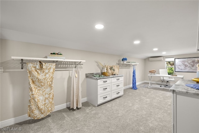 211 11th St NW, Naples, FL 34120 - walk in closet with an AC wall unit and light colored carpet