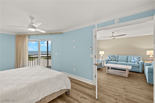3067 W Gulf Dr Unit 102, Sanibel, FL 33957 - bedroom with access to outside, crown molding, wood finished floors, and ceiling fan