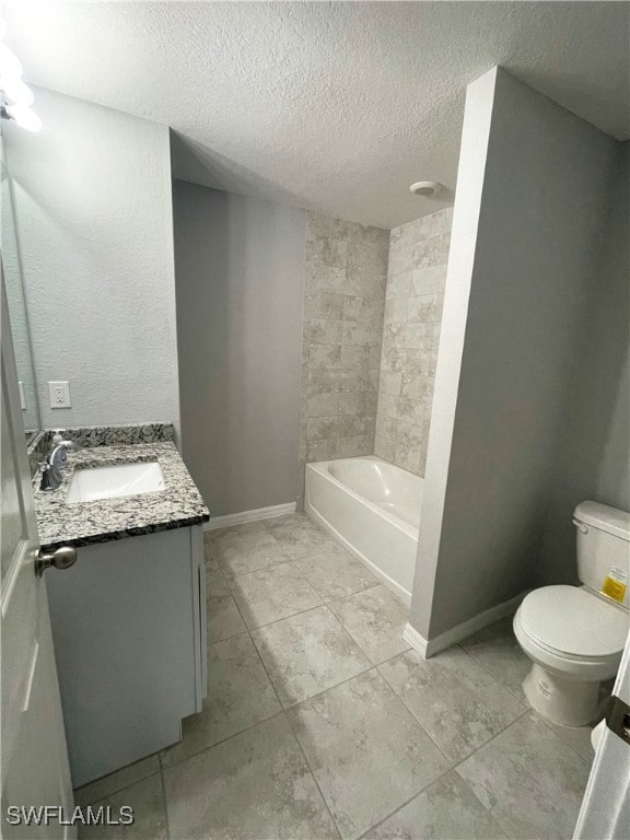 2614 NE 6th Pl, Cape Coral, FL 33909 - bathroom featuring vanity, a textured ceiling, tile patterned flooring, and tub / shower combination