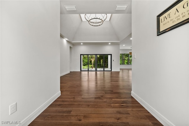 3708 Stagg Ct, Fort Myers, FL 33905 - corridor with a chandelier, high vaulted ceiling, wood finished floors, and recessed lighting