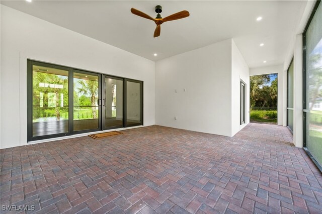 3708 Stagg Ct, Fort Myers, FL 33905 - empty room featuring a ceiling fan, brick flooring, and recessed lighting