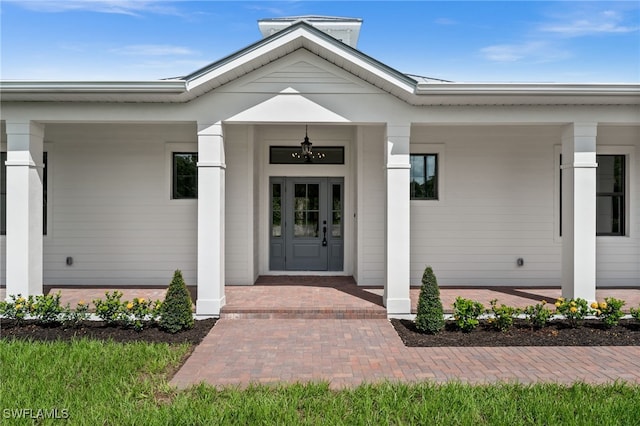 3708 Stagg Ct, Fort Myers, FL 33905 - view of exterior entry featuring covered porch
