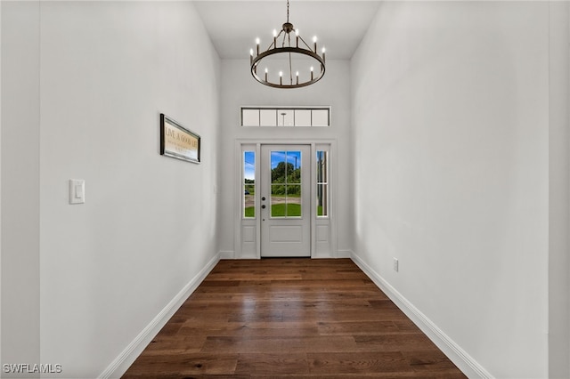 3708 Stagg Ct, Fort Myers, FL 33905 - foyer entrance featuring a chandelier, dark wood-style floors, and a high ceiling