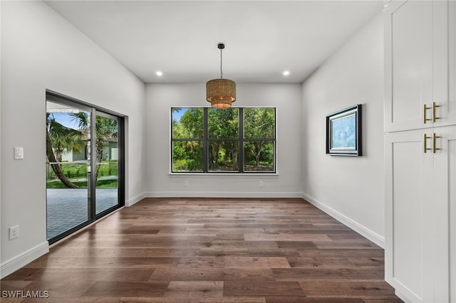3708 Stagg Ct, Fort Myers, FL 33905 - unfurnished dining area with plenty of natural light, dark wood-style flooring, and recessed lighting
