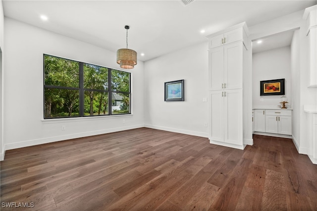 3708 Stagg Ct, Fort Myers, FL 33905 - unfurnished dining area featuring dark wood-style floors and recessed lighting