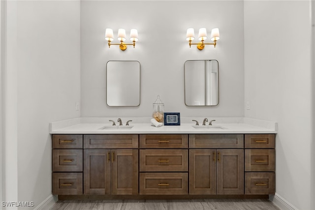 3708 Stagg Ct, Fort Myers, FL 33905 - bathroom featuring double vanity and wood finished floors