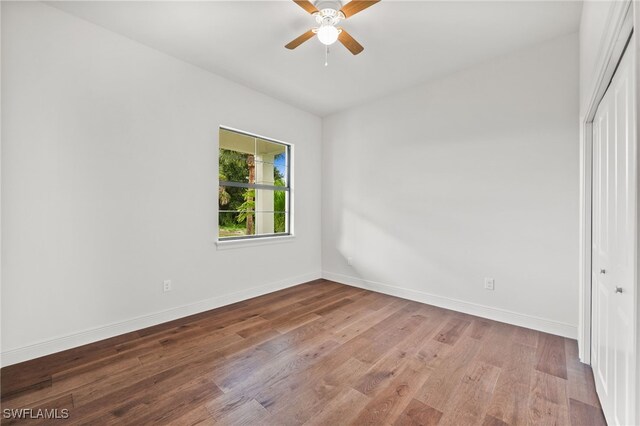 3708 Stagg Ct, Fort Myers, FL 33905 - unfurnished bedroom featuring a closet, wood finished floors, and ceiling fan