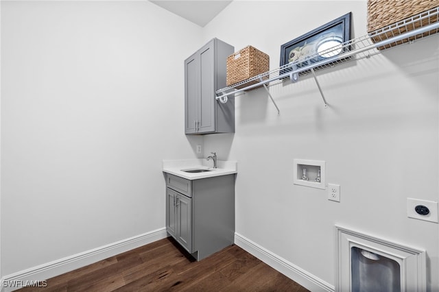 3708 Stagg Ct, Fort Myers, FL 33905 - washroom featuring hookup for an electric dryer, hookup for a washing machine, dark wood-type flooring, and cabinet space