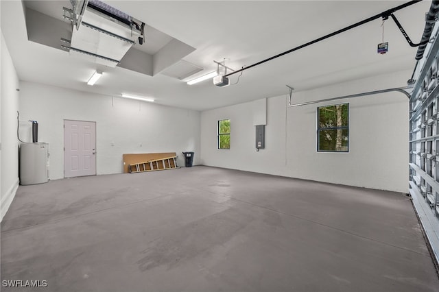 3708 Stagg Ct, Fort Myers, FL 33905 - garage with a garage door opener, electric panel, and water heater