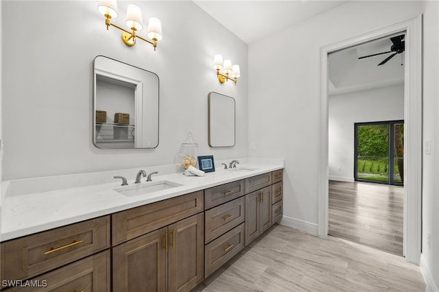 3708 Stagg Ct, Fort Myers, FL 33905 - full bath with double vanity, a chandelier, and a ceiling fan