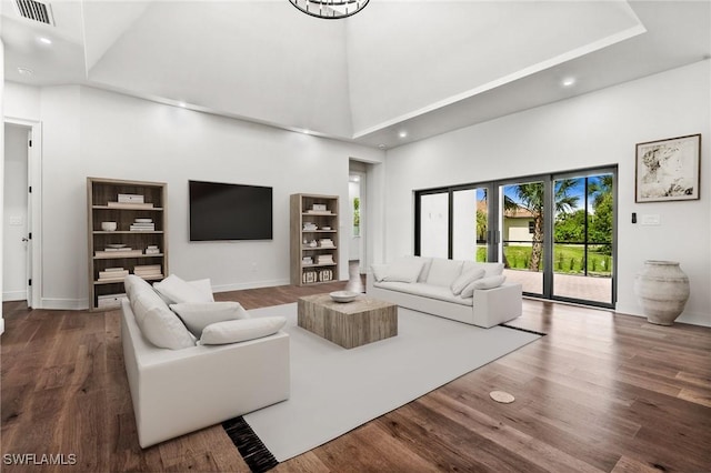3708 Stagg Ct, Fort Myers, FL 33905 - living room featuring a high ceiling, wood finished floors, and recessed lighting