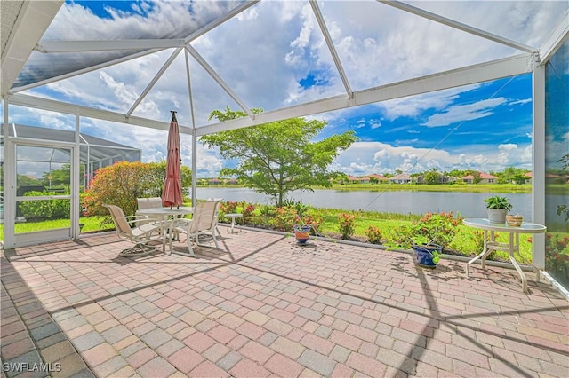 3344 Apple Blossom Dr, Alva, FL 33920 - view of patio with a water view, a lanai, and outdoor dining space