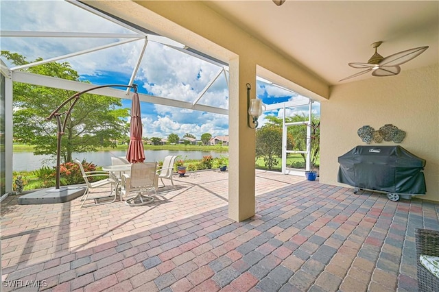 3344 Apple Blossom Dr, Alva, FL 33920 - view of patio / terrace with a water view, area for grilling, a lanai, ceiling fan, and outdoor dining area