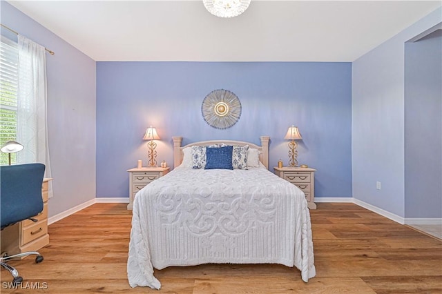 3344 Apple Blossom Dr, Alva, FL 33920 - bedroom with baseboards and wood finished floors