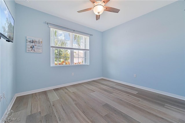 3344 Apple Blossom Dr, Alva, FL 33920 - spare room featuring wood finished floors and a ceiling fan