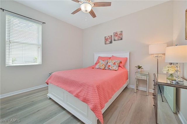3344 Apple Blossom Dr, Alva, FL 33920 - bedroom with light wood finished floors, multiple windows, and ceiling fan