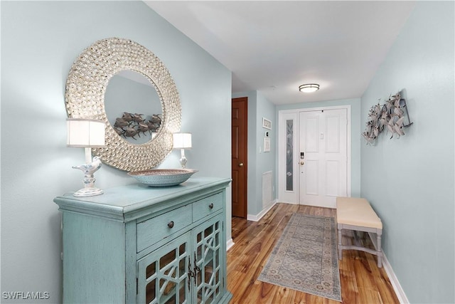 1925 Clifford St Unit 202, Fort Myers, FL 33901 - entryway featuring light wood finished floors and baseboards