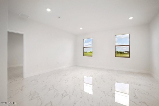 7007 Ramrod Cir, Labelle, FL 33935 - unfurnished room featuring recessed lighting and light marble finish floors